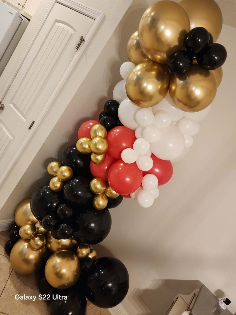 Statement garland in black, red, white and chrome gold